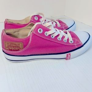Gently used pink Levis converse women’s sneakers